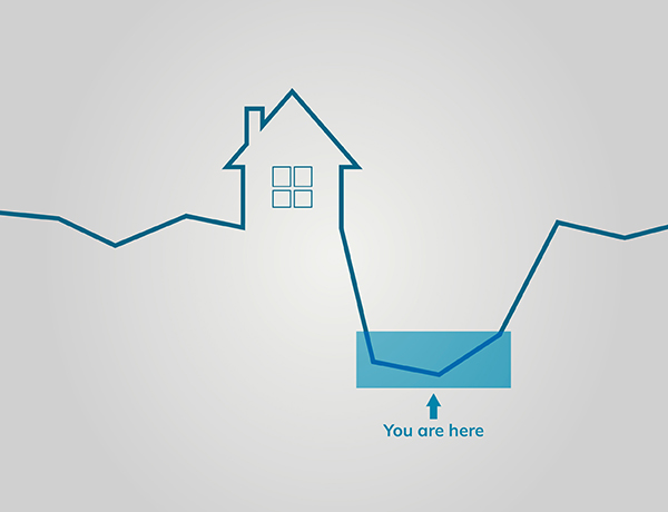 a house with a downward arrow going up.