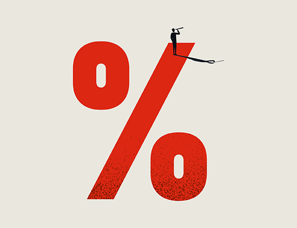 a man standing on top of a red percentage sign.