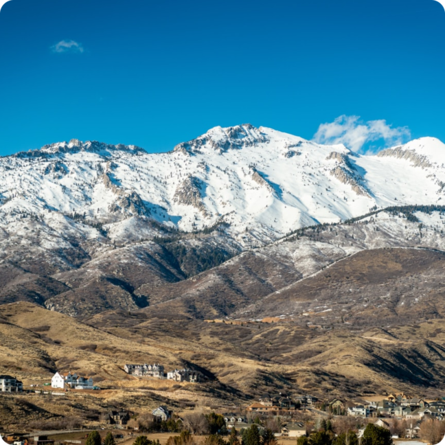 a view of a snow covered mountain range